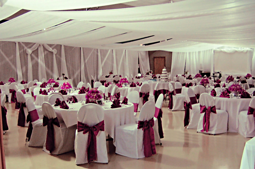 Cranberry Colored Wedding Reception Room View With Centerpieces By Wanderfuls.