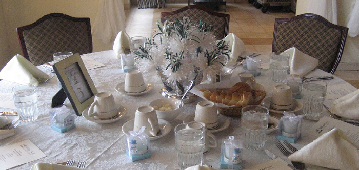 White And Teal Wanderfuls Centerpiece At Marissa’s Tea Party Wedding Shower.